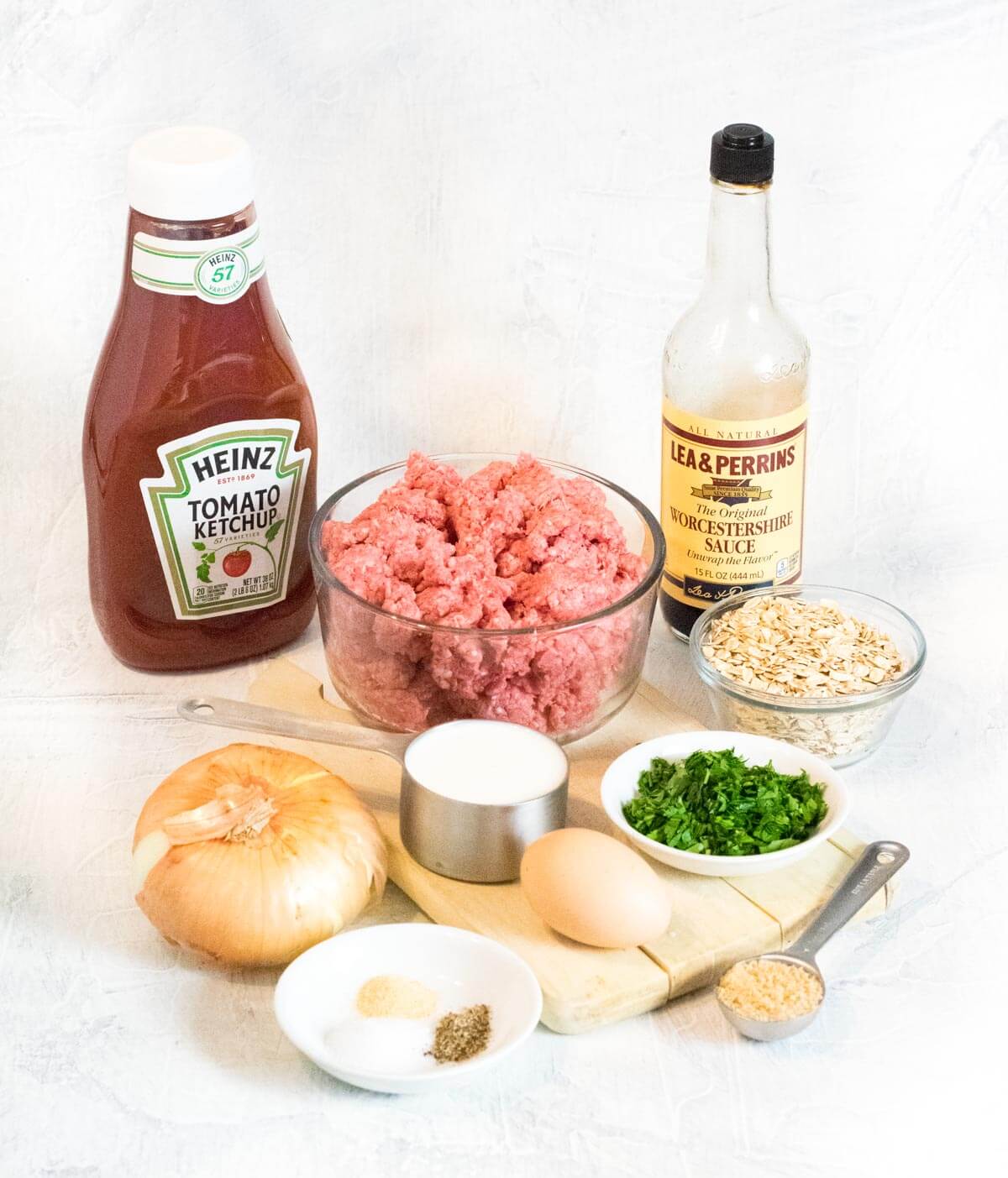 Showing meatloaf ingredients with oatmeal.